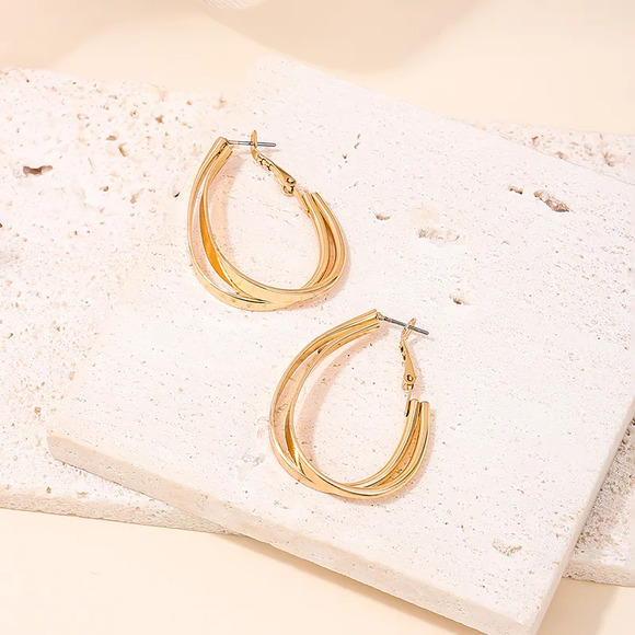 Elegant Gold tone Elongated Hoop Earrings - Picture 1 of 2